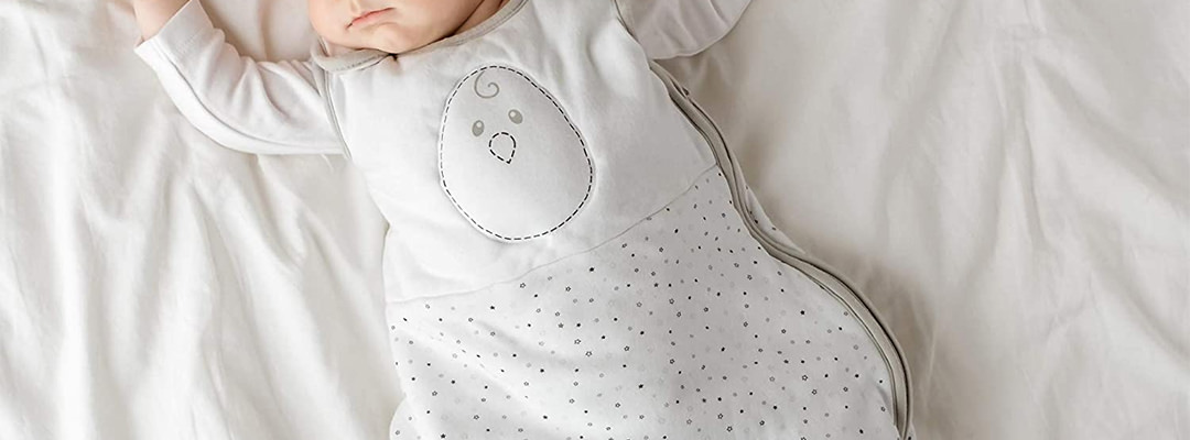 A baby in a sleep sack