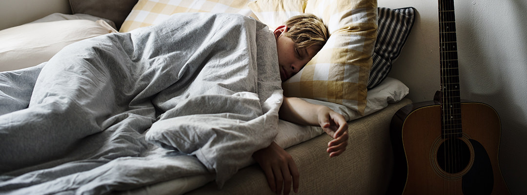 A teenager sleeping